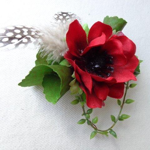 red anemone corsage