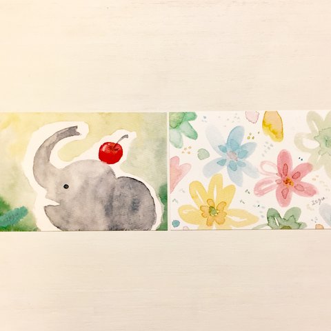 🐘透明水彩画「幸せを呼ぶぞうとお花畑」イラストポストカード2枚セット バースデーカード　メッセージカード　ゾウ　象　花　フラワー🐘
