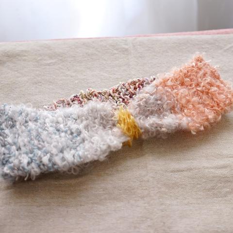 毛糸手編みのヘアバンド