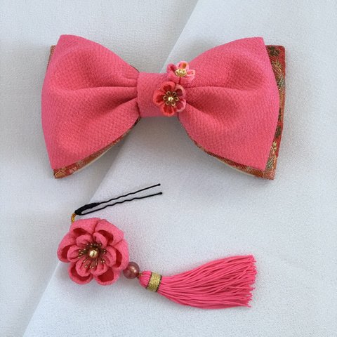 袴の装い＊ピンクの髪飾りと帯飾り
