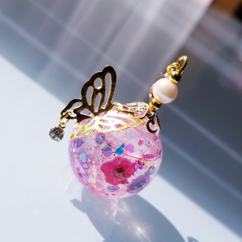 water glass   butterfly charm