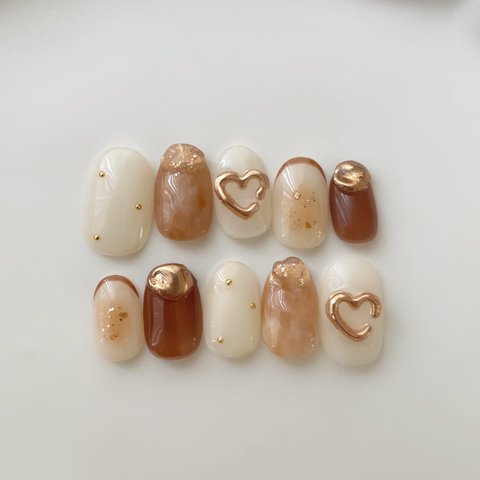 white × brown heart 🤎