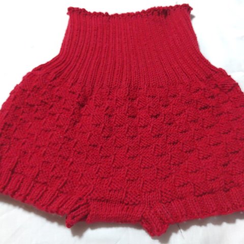 市松模様の赤の毛糸のパンツ