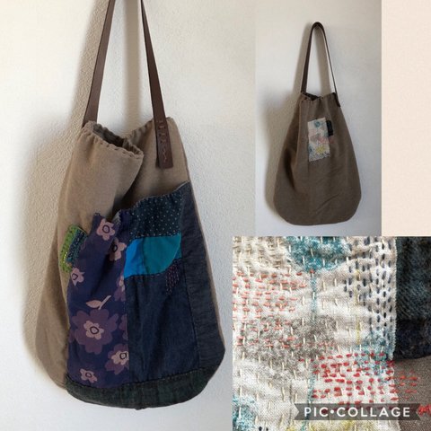 大きなポケットの付いた大きなショルダーbag