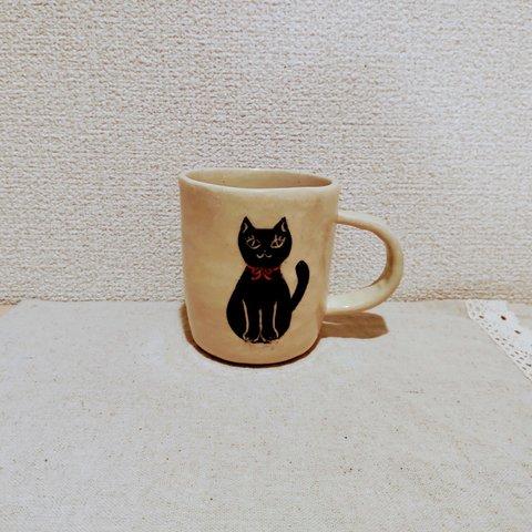 黒猫のマグカップ