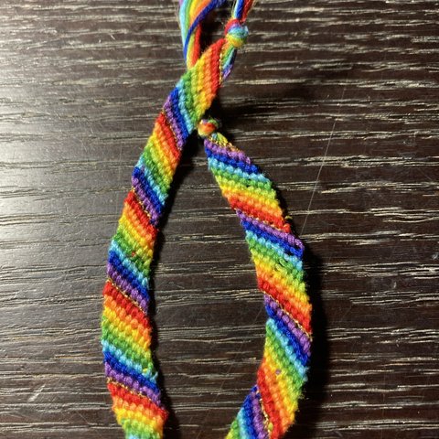 Rainbow color misanga including gold string within.