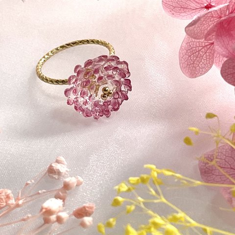 【9号・11号】透明なピンクのお花のリング(金色)