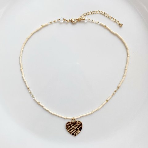 ビーズネックレス "creamy gold logo heart"