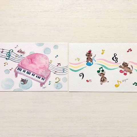 🎹透明水彩画「ピンクのピアノ  音楽好きの猫たち 」イラストポストカード 2枚セット　ねこ　ネコ　楽器　音符🎹