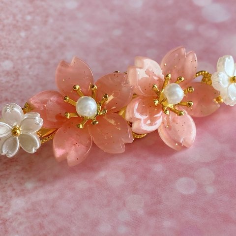 桜のヘアクリップ オーロラピンク色