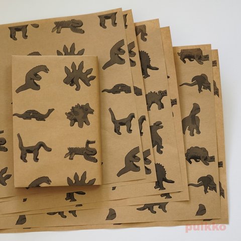 紙製ブックカバー　アカンバロの恐竜土偶