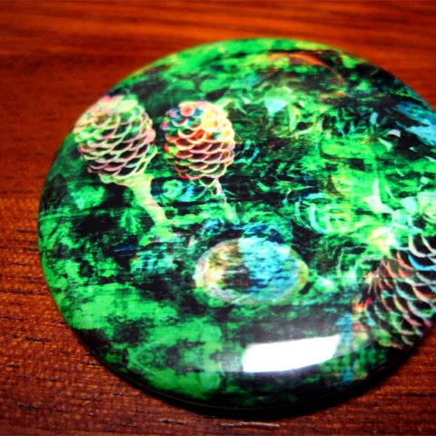 tin badge "Primordial breath"