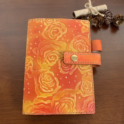 オレンジの花柄レザーの手帳カバー A6サイズ