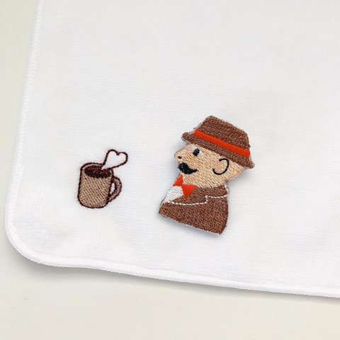  「紳士(茶色)のバッジ」と「ワンポイント刺繍のハンドタオル」のセット 
