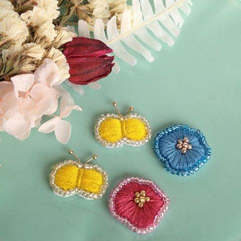 北欧風アシメちょうちょとお花の刺繍ピアス/イヤリング