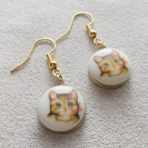 猫 ボタン ピアス