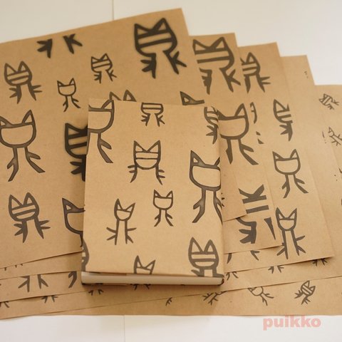 紙製ブックカバー　猫っぽい古代文字
