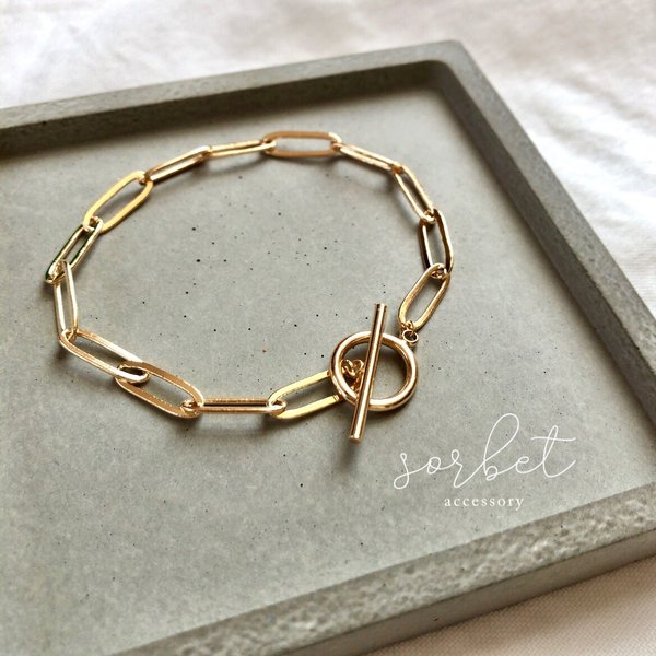 long oval chain × mantel bracelet